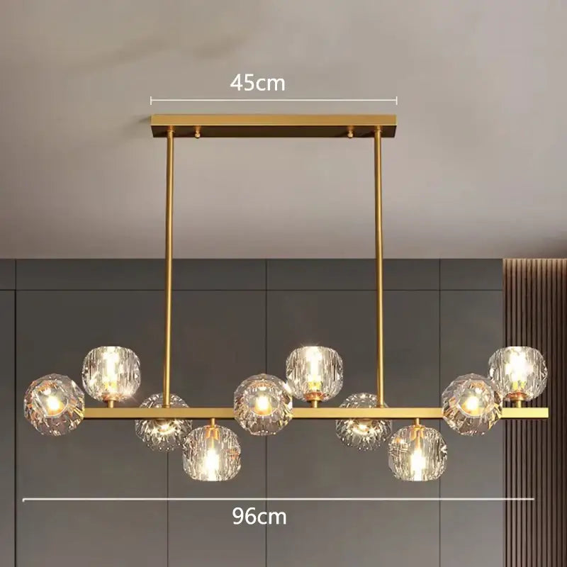 Gold-toned decorbites led pendant chandelier with multiple faceted crystal globe lights for modern indoor lighting