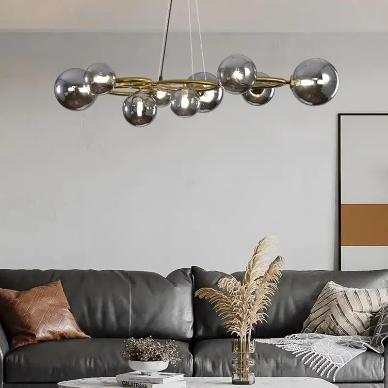Modern chrome-finished spherical decorbites led pendant light with gold-toned frame for indoor pendant lights