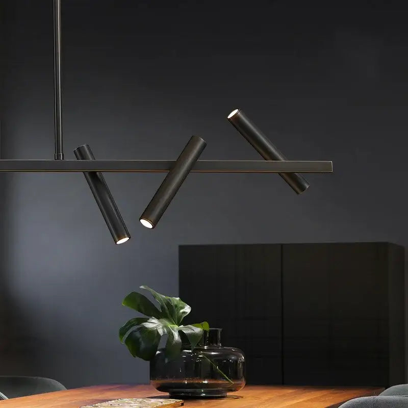 Modern black metal pendant light with angled cylindrical arms and warm leds by DecorBites led pendant light chandelier