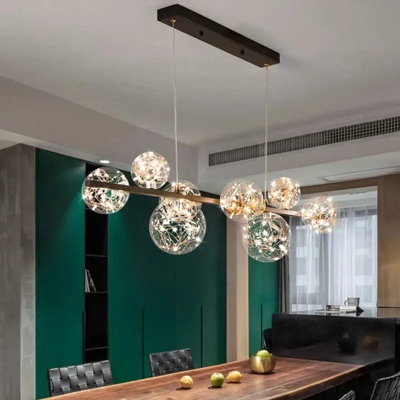 Modern decorbites led pendant light chandeliers with clear glass spheres and warm glowing lights for indoor use
