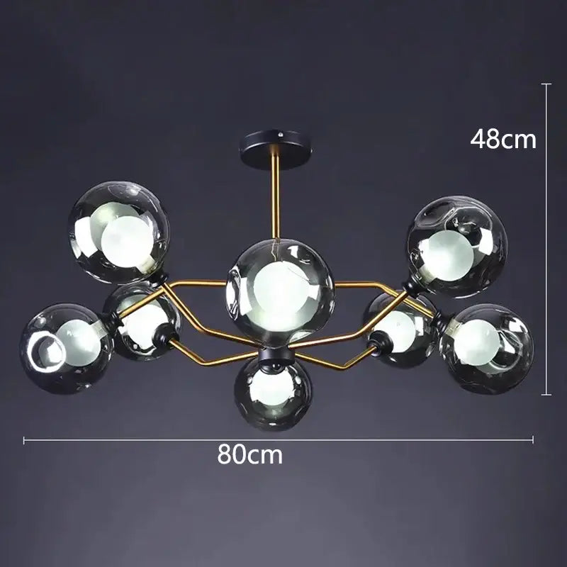 Modern chandelier pendant lights with seven black glass spheres on gold metal frame by DecorBites led pendant light