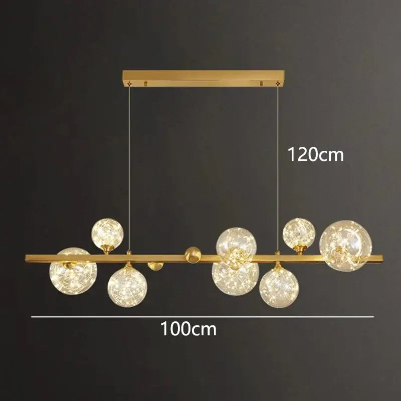 Gold-toned DecorBites led pendant light chandelier with clear textured glass spheres for modern indoor lighting