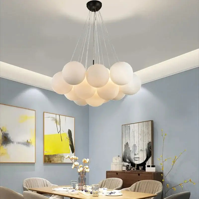 Decorbites led pendant light chandeliers featuring frosted white spherical bulbs on black ceiling mount for modern decor