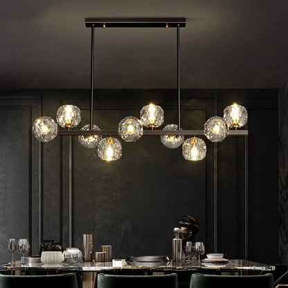 Modern black metal chandelier with faceted clear glass globes as a decorbites led pendant light for indoor lighting