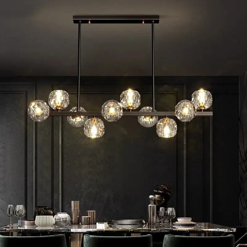 Modern black metal chandelier with faceted clear glass globes as a decorbites led pendant light for indoor lighting