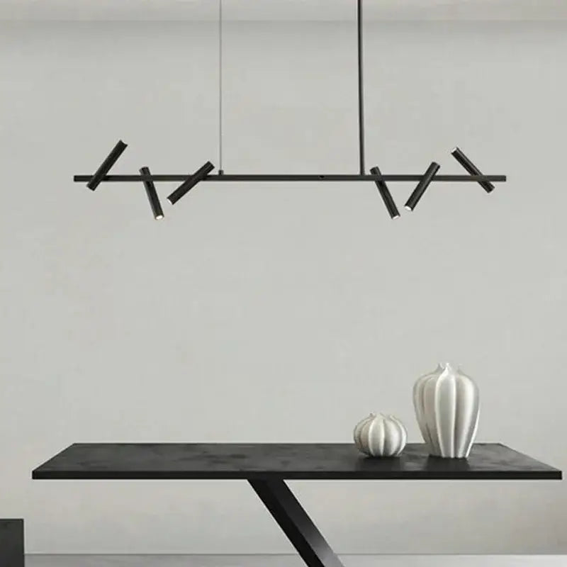 Black minimalist decorbites led pendant light with angular branch-like arms and sleek cylindrical fixtures for indoor lighting