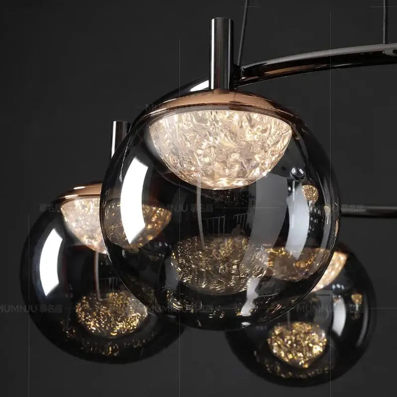 Modern spherical pendant lights with clear textured glass globes and polished chrome finish by DecorBites led pendant
