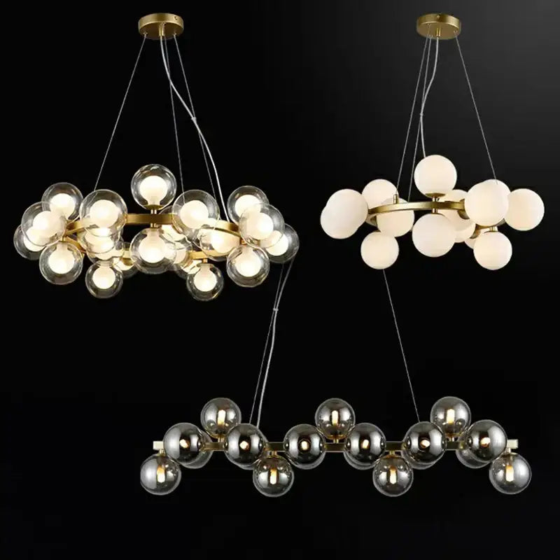 Gold-toned DecorBites LED pendant light chandelier with spherical glass bulbs in clear frosted white and mirrored finishes