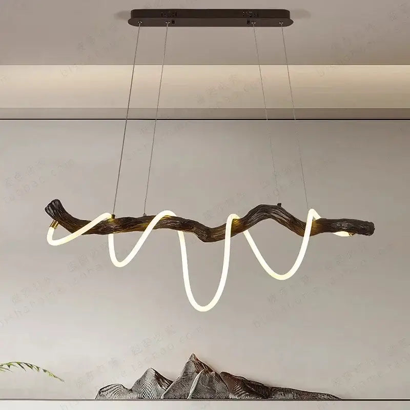 A modern DecorBites led pendant light featuring a dark textured wooden branch with an integrated white led neon strip