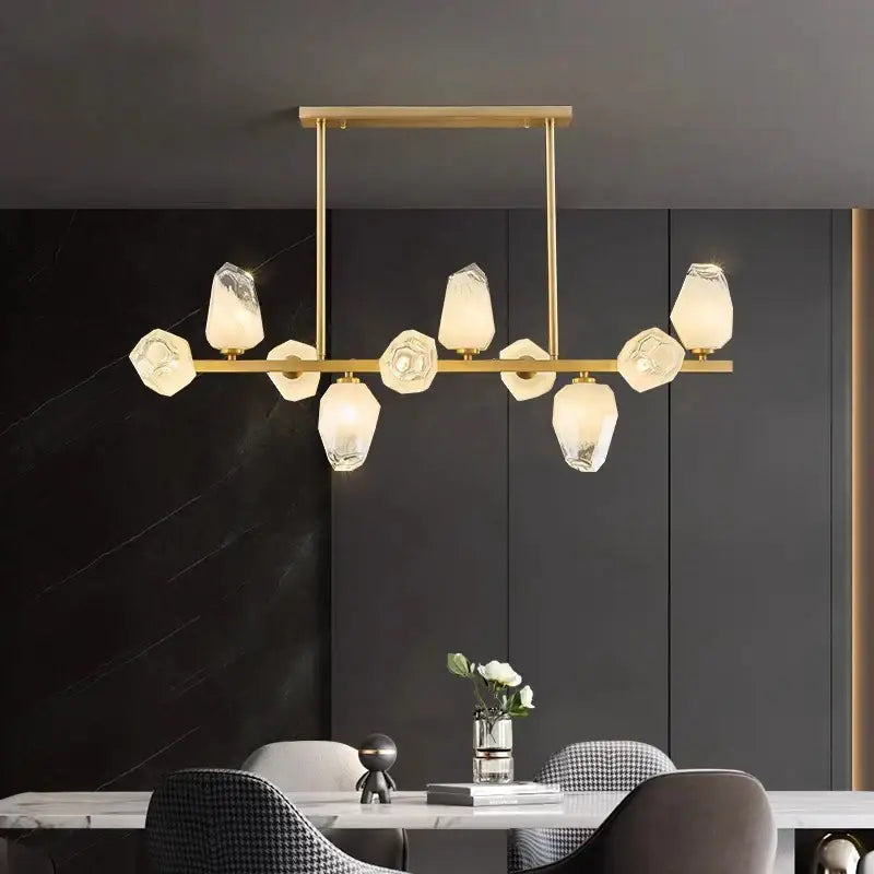 Gold-toned DecorBites LED pendant light chandelier with faceted translucent glass shades for modern home decor