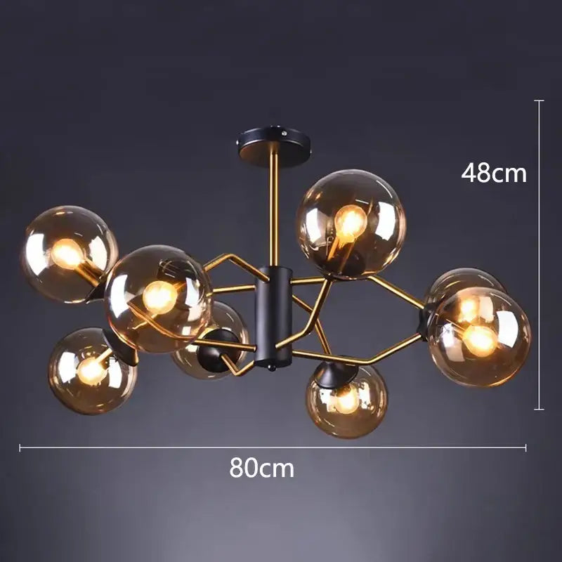 Modern decorbites led pendant light chandelier with black frame gold metal arms and amber glass globes for dining room lighting