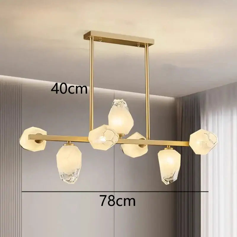 Gold-toned DecorBites LED pendant light chandelier with faceted crystal glass shades for modern living room lighting