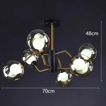 Modern chandelier pendant lights with six reflective glass globes on black and gold metal frame by DecorBites LED pendant