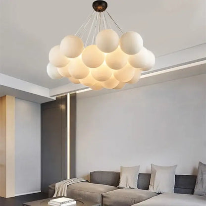 Modern white spherical decorbites led pendant light chandeliers with metallic central fixture for indoor lighting