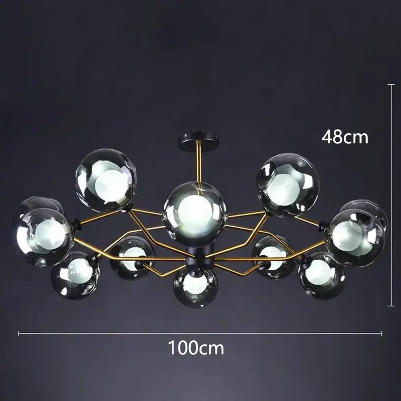 Modern chandelier with gold-toned metal frame and dark glass spheres for decorbites led pendant light dining rooms