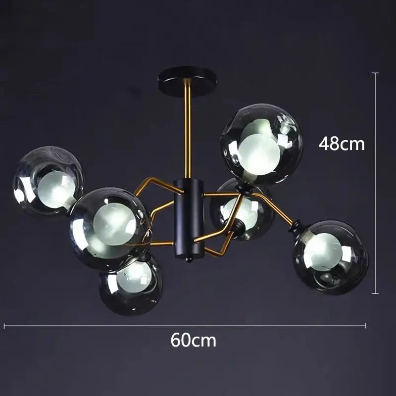 Modern black and gold DecorBites LED pendant light chandelier with six reflective glass spheres for dining room lighting