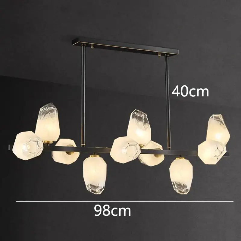 Modern black metal decorbites led pendant light chandelier with faceted crystal glass shades emitting warm glow