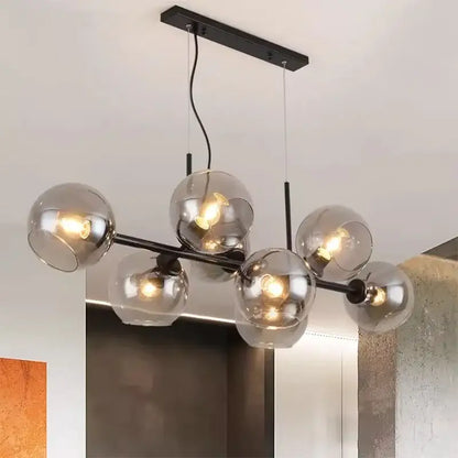 Modern black metal DecorBites led pendant chandelier with six smoked glass globes for living and dining room decor