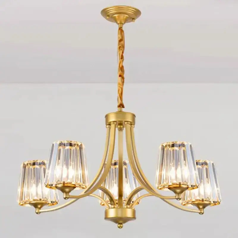 Gold-toned decorbites led pendant chandelier with five crystal-encased lights and twisted brass chain for modern living rooms