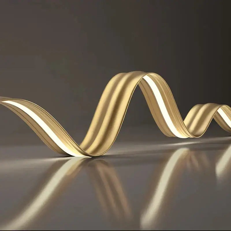 A sleek golden wave-shaped DecorBites led pendant light with smooth flowing design for modern living and dining rooms