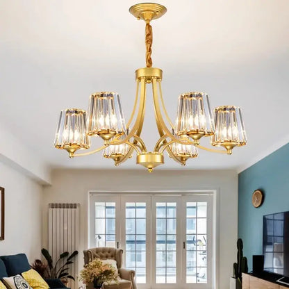 Gold-toned decorbites led pendant light chandelier with six crystal encased fixtures and twisted brass chain for modern rooms