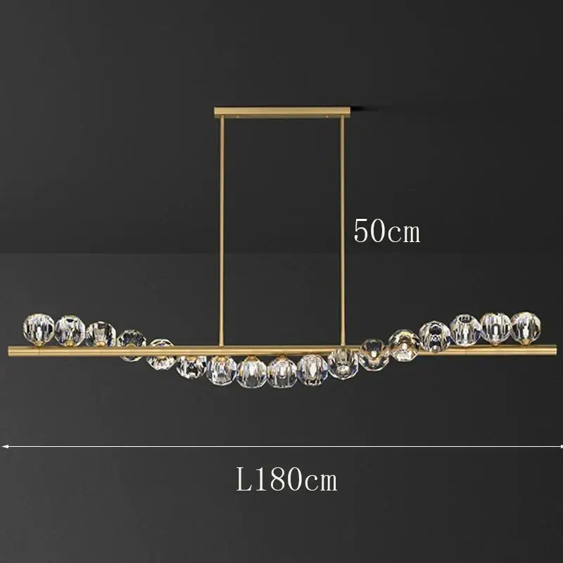Gold-toned DecorBites led pendant light chandelier with clear crystal spheres for modern living and dining rooms