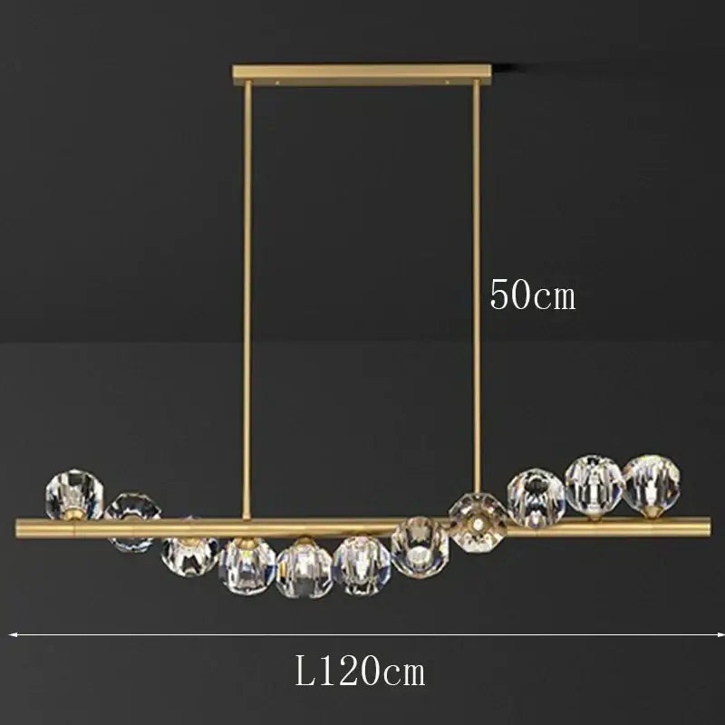 Gold-toned decorbites led pendant light chandelier with faceted crystal spheres for modern living and dining rooms