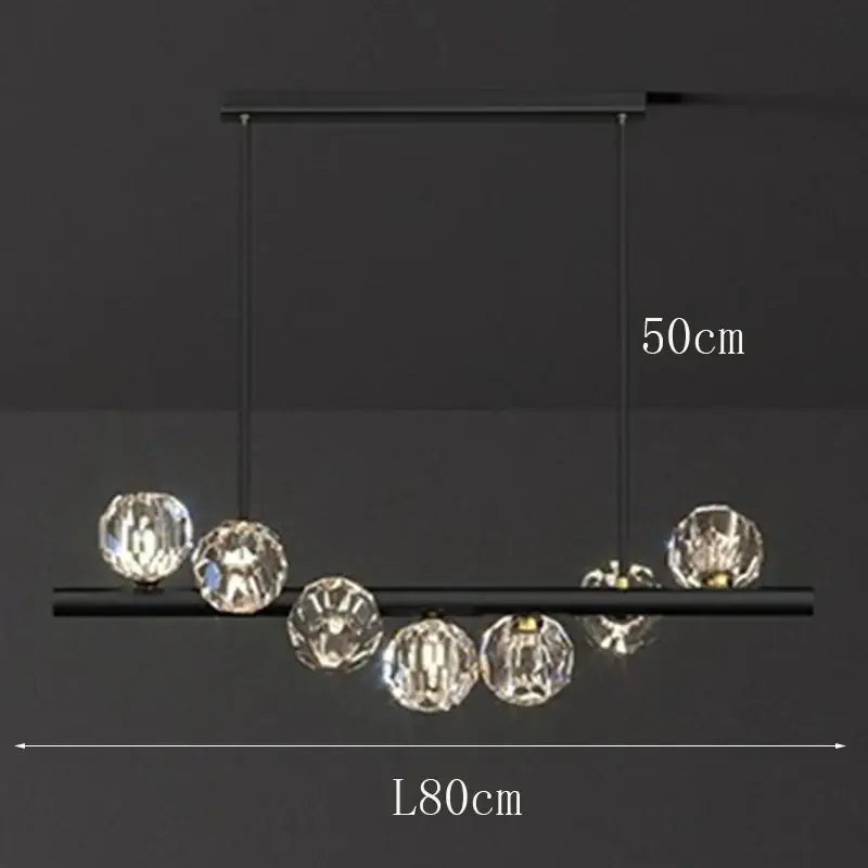 Modern black metal DecorBites LED pendant light with clear faceted crystal spheres for living and dining room lighting