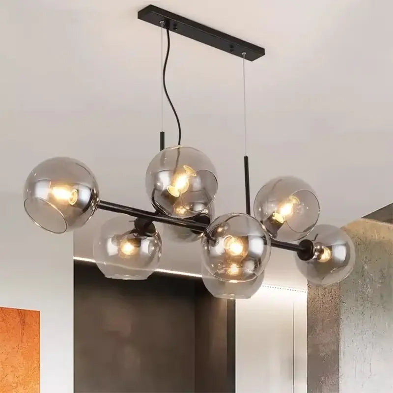 Modern black metal DecorBites LED pendant light with six smoked glass globe shades for living room lighting