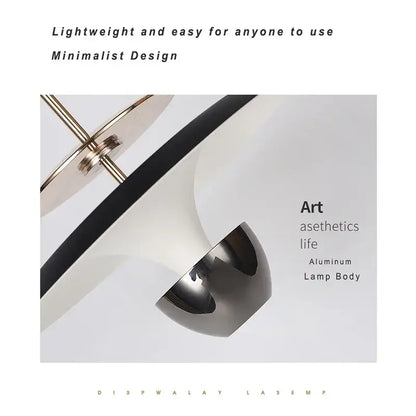 Minimalist aluminum DecorBites LED pendant light with sleek white and black curved design for kitchen or bedroom