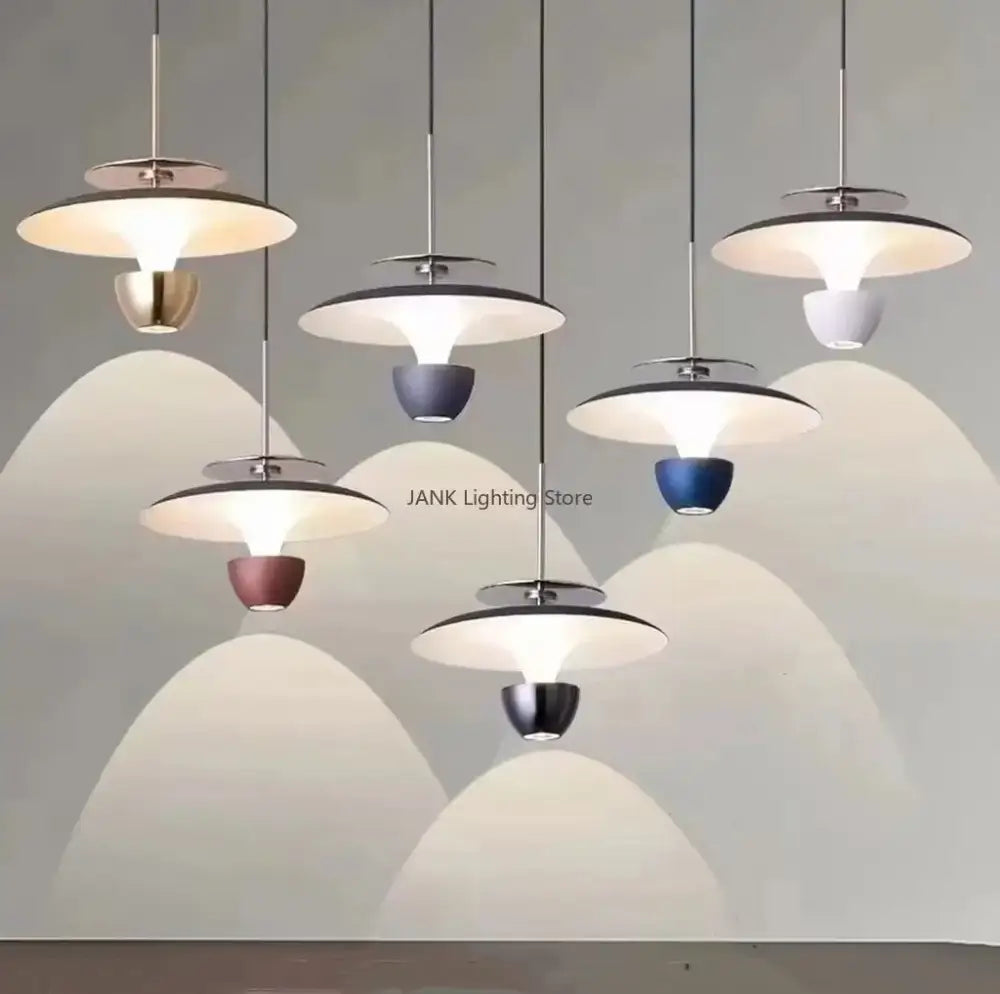 Modern DecorBites™ LED pendant light with sleek metallic disc shades and colorful bases for kitchen and dining room