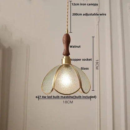 Decorbites led pendant light featuring a textured glass shade, brass accents, walnut handle, and adjustable copper socket