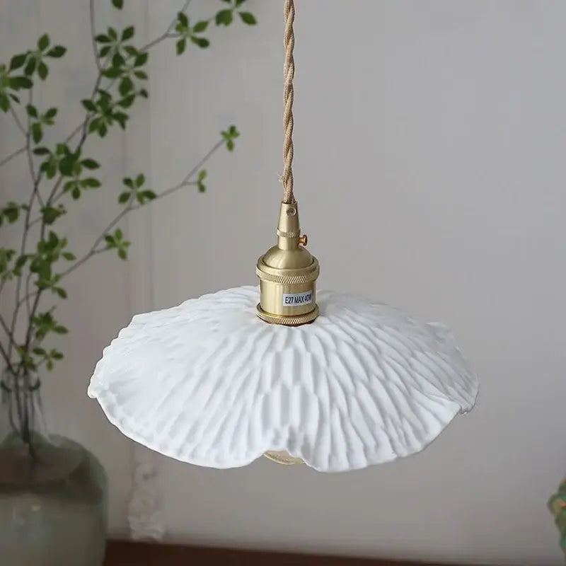 White ceramic decorbites led pendant light fixture with textured fluted shade and brass hardware for elegant lighting
