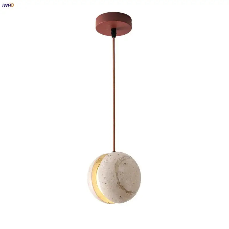 Copper-toned DecorBites LED pendant light with spherical white marble shade and gold trim for yellow travertine decor