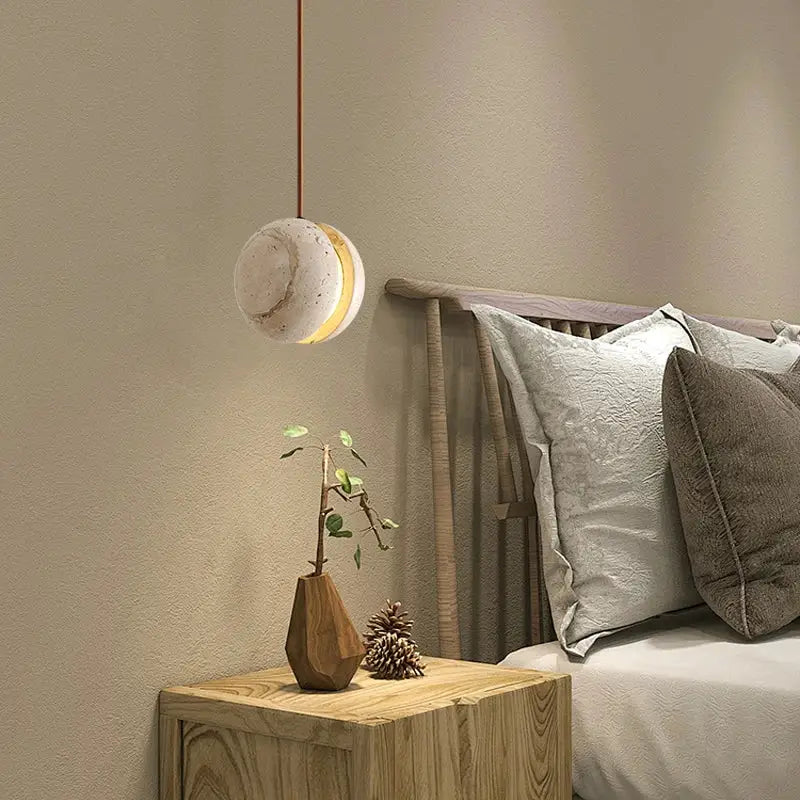 Decorbites led pendant light fixture with yellow travertine textured concrete shade and warm glow minimalist pendant light