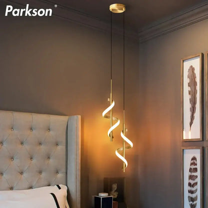Gold-toned Parkson spiral pendant light with sleek modern design and warm ambient glow for DecorBites LED pendant light
