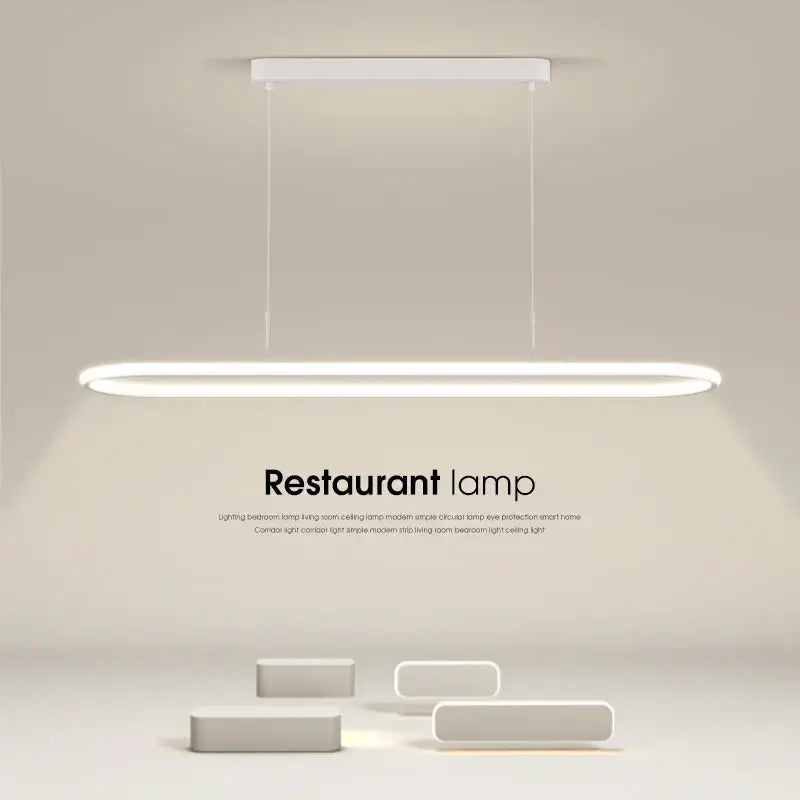 A sleek white decorbites led pendant light with a minimalist rectangular design for dining table and kitchen lighting