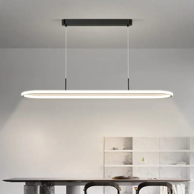 Modern black decorbites led pendant light with sleek oval led fixture suspended by thin cords for dining table lighting
