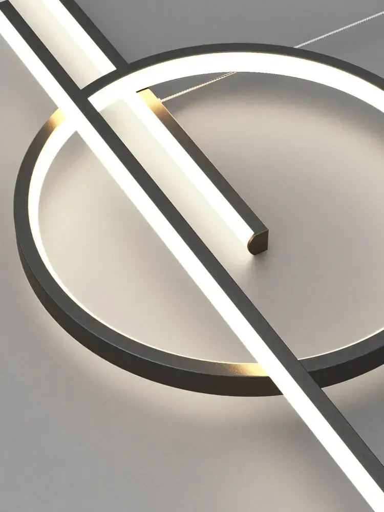Modern minimalist decorbites led pendant light with sleek black frame and glowing white led strips for indoor use