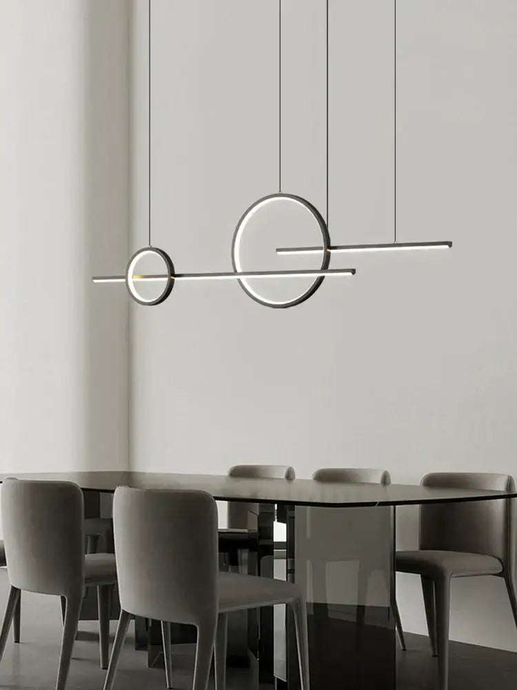 Modern minimalist decorbites led pendant light with sleek black circular and linear elements for indoor use