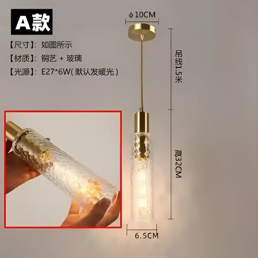 Slender decorbites led pendant light with textured gold metal top and clear glass body housing e27 warm white bulb