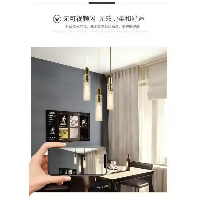 Three elegant gold-toned DecorBites LED pendant lights with frosted glass shades for modern home decor