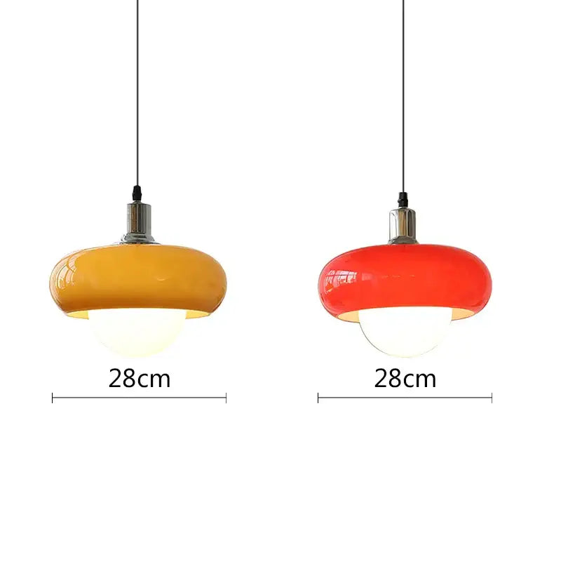 Two vibrant 28cm amber and red glass decorbites led pendant lights with black cords for modern bedroom and dining room