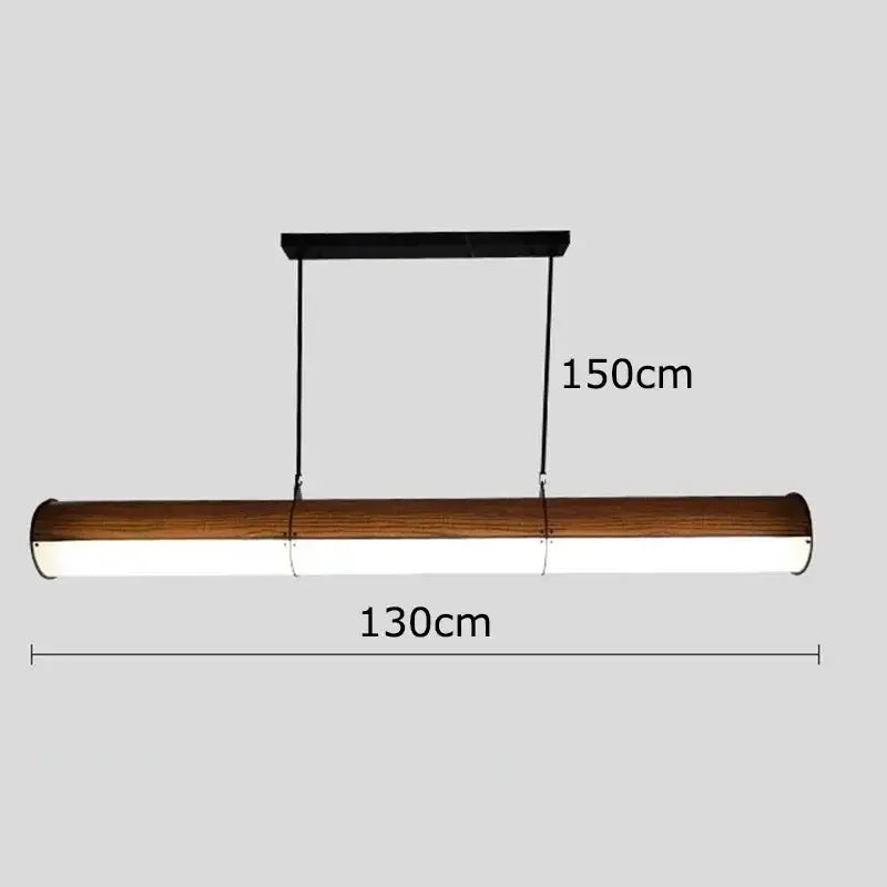 A sleek 130cm decorbites led pendant light with warm wood grain finish and integrated led for living and dining rooms