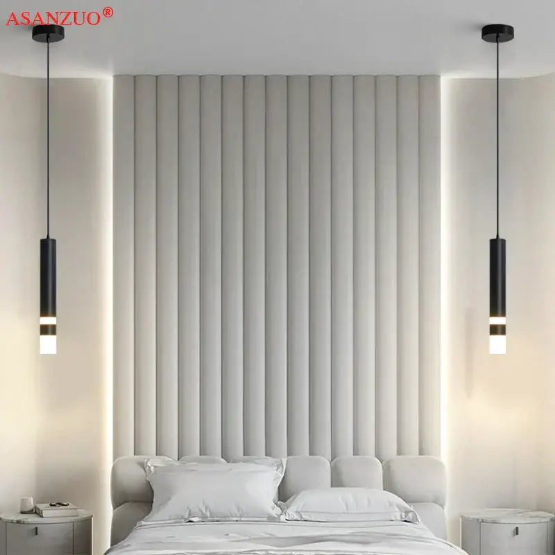 Black cylindrical decorbites led pendant light with warm led illumination for modern minimalist living spaces