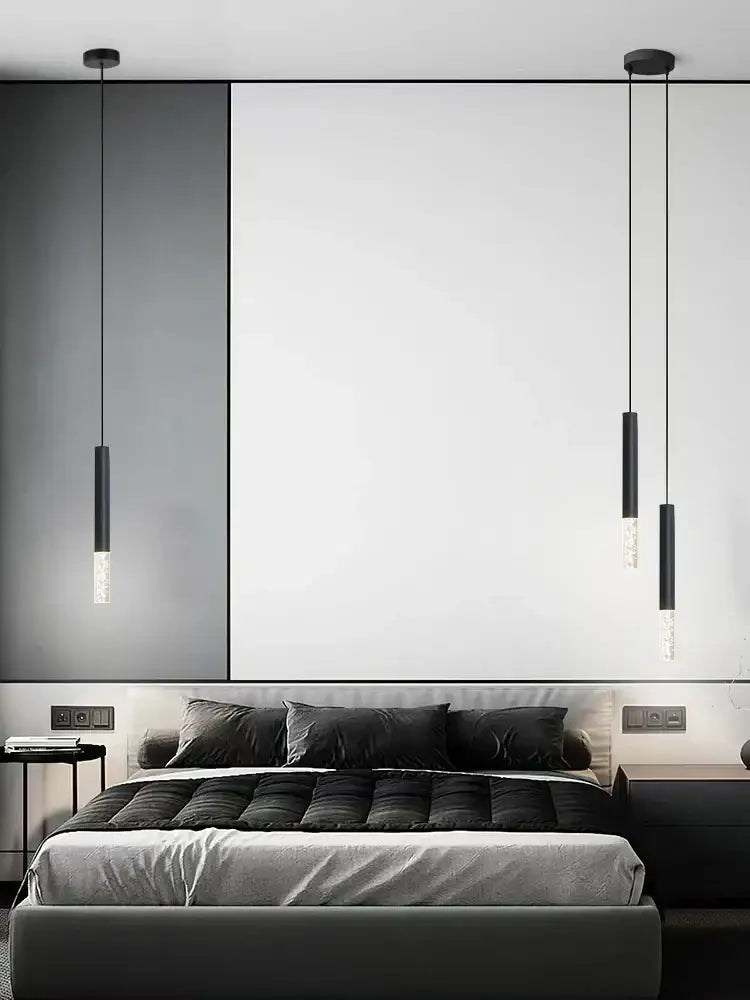 Black cylindrical DecorBites led pendant light with frosted glass accents for restaurant and living room lighting