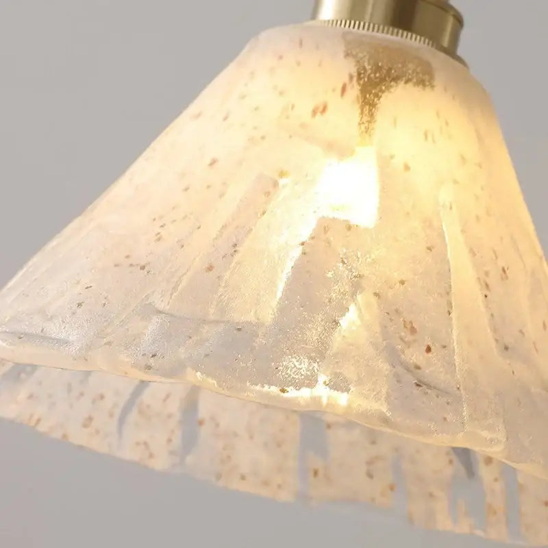 Decorbites™ led pendant light with a warm translucent white glass lampshade featuring a speckled pattern and fluted edges