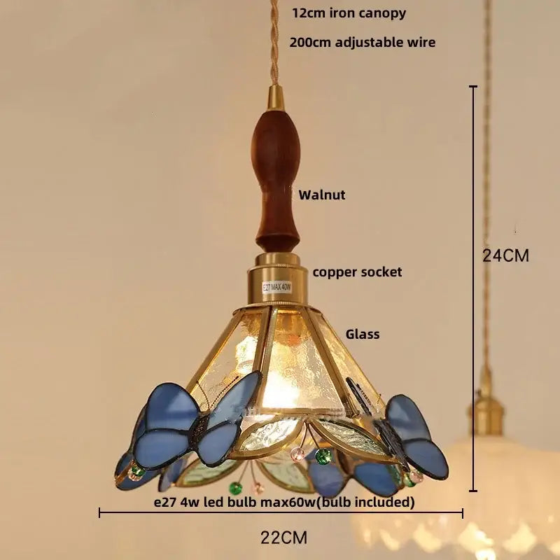 Decorbites™ led pendant light with walnut-finished iron canopy, copper socket, and white glass stained shade with blue butterflies