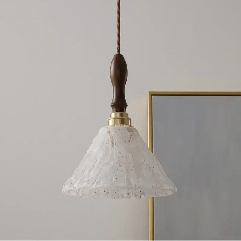 DecorBites led pendant light with delicate white speckled glass, walnut wood handle, and brass copper socket accents