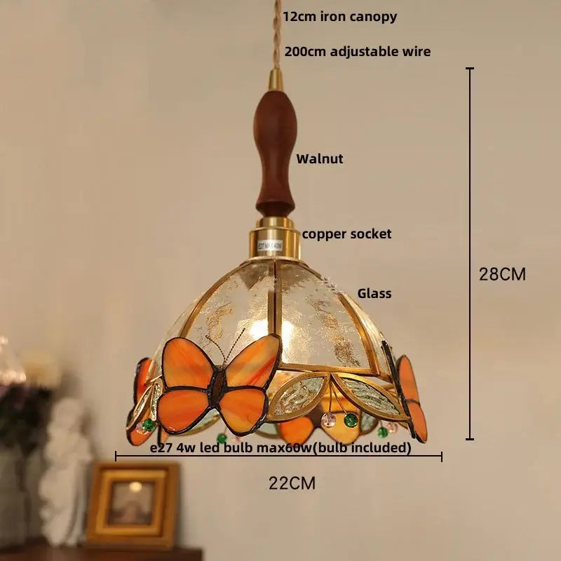 Decorbites™ led pendant light with white glass and butterfly stained glass design suspended from walnut wood canopy